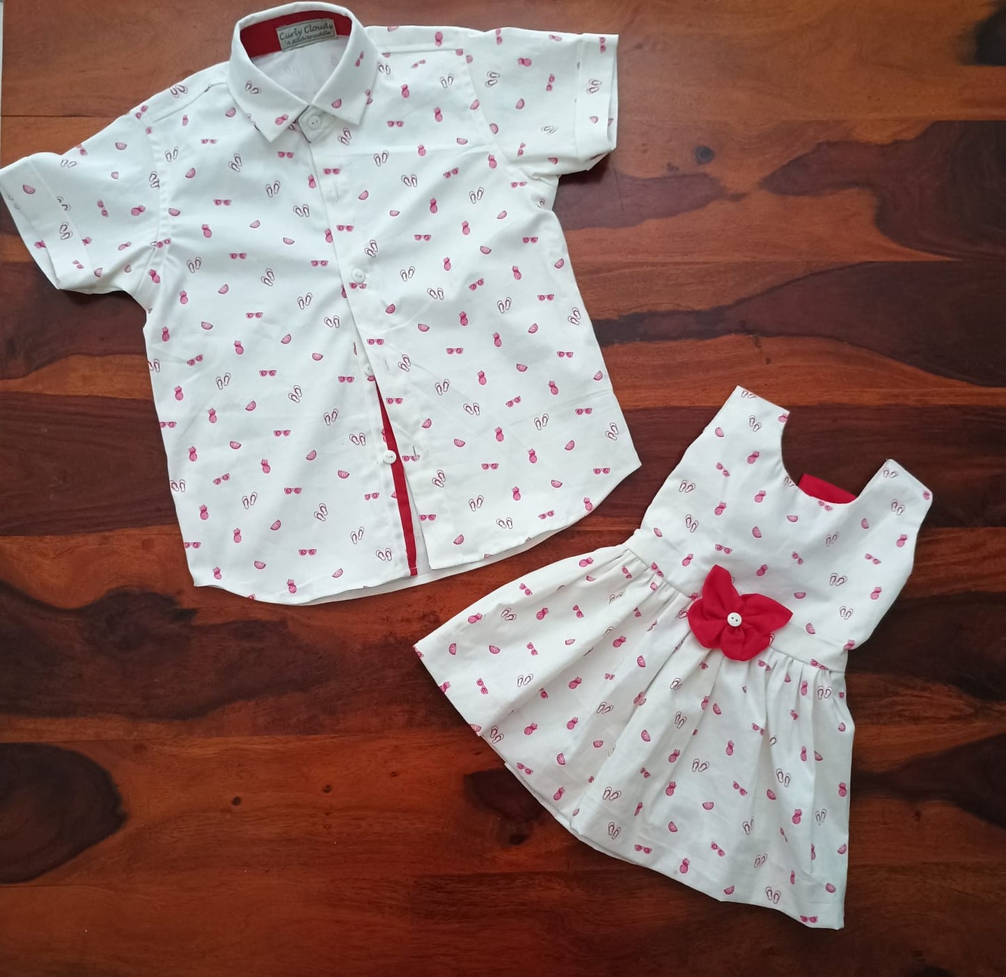 Sleeveless off white beach print dress