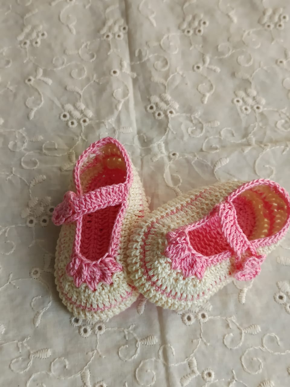 Cream with bright baby pink booties