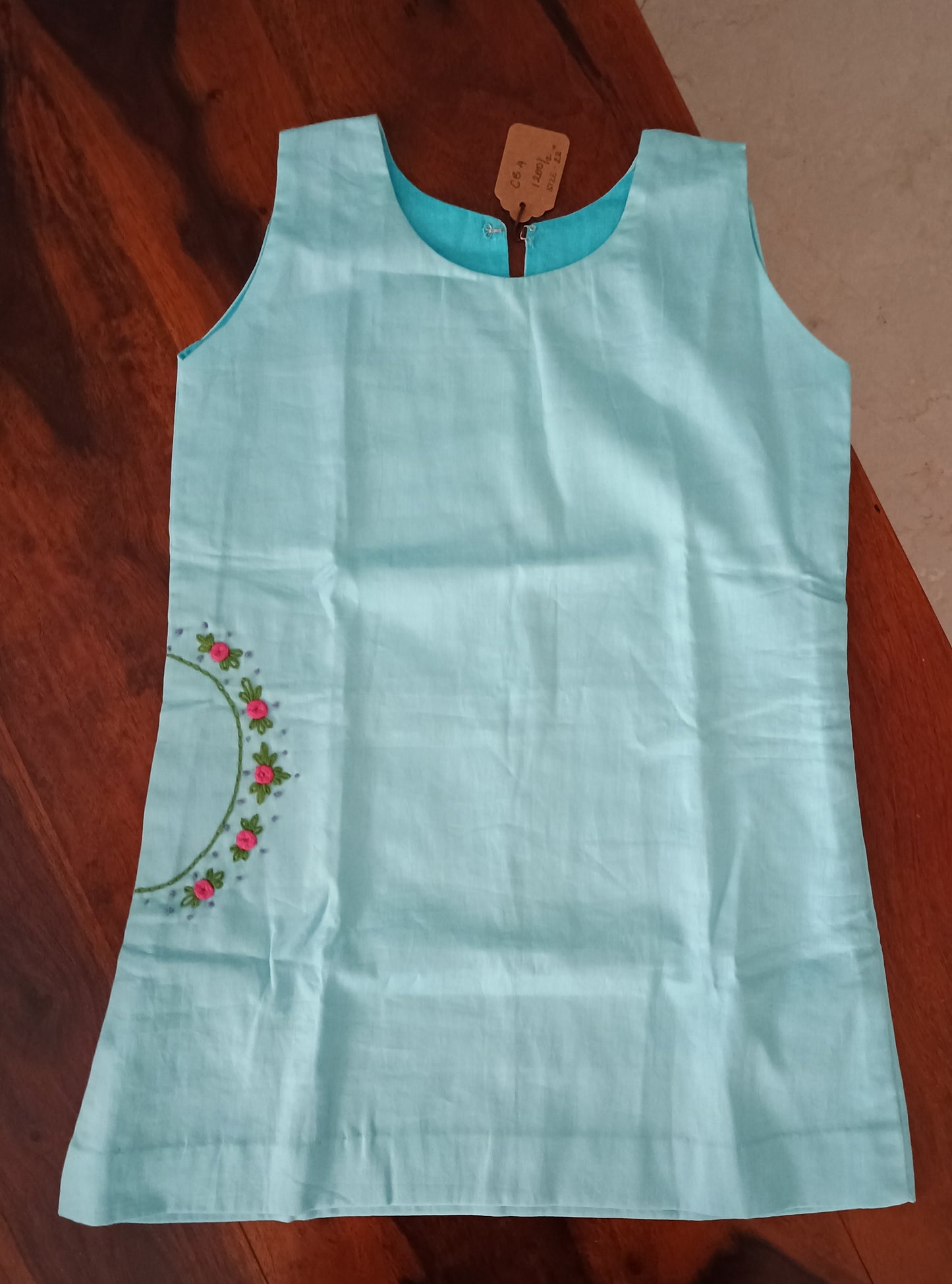 Sleeveless blue cotton satin with hand embroidery