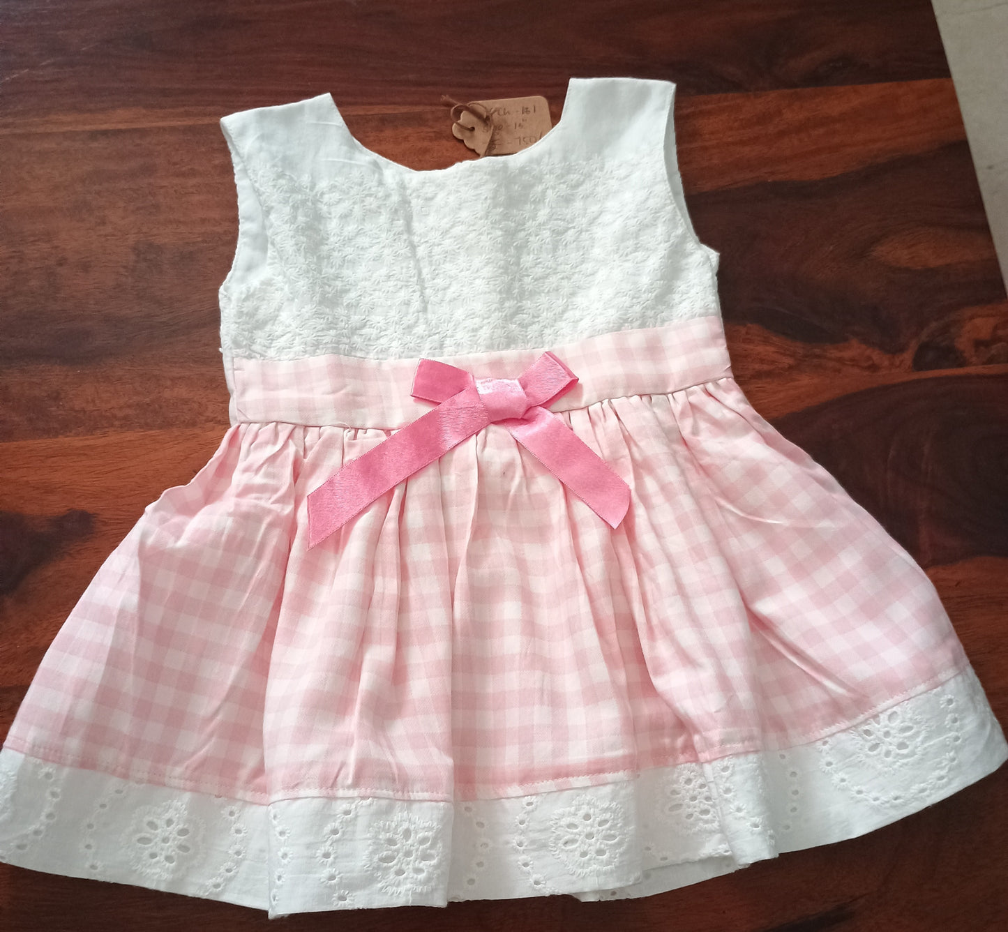 Sleeveless cotton pink checks frock