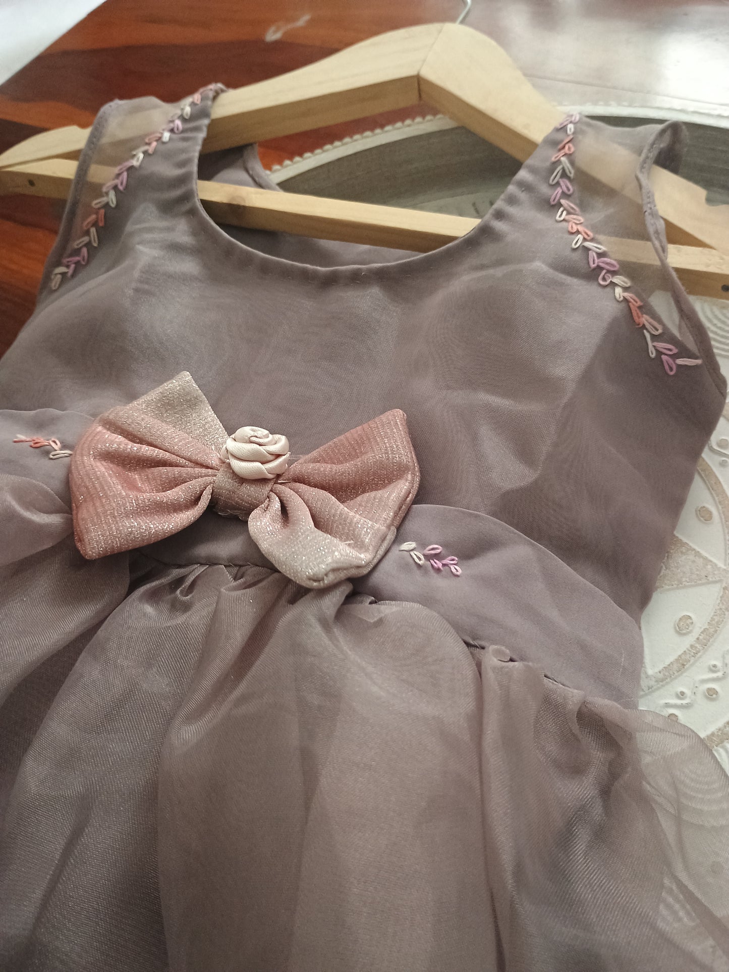 Deep mauve sleeveless organza.