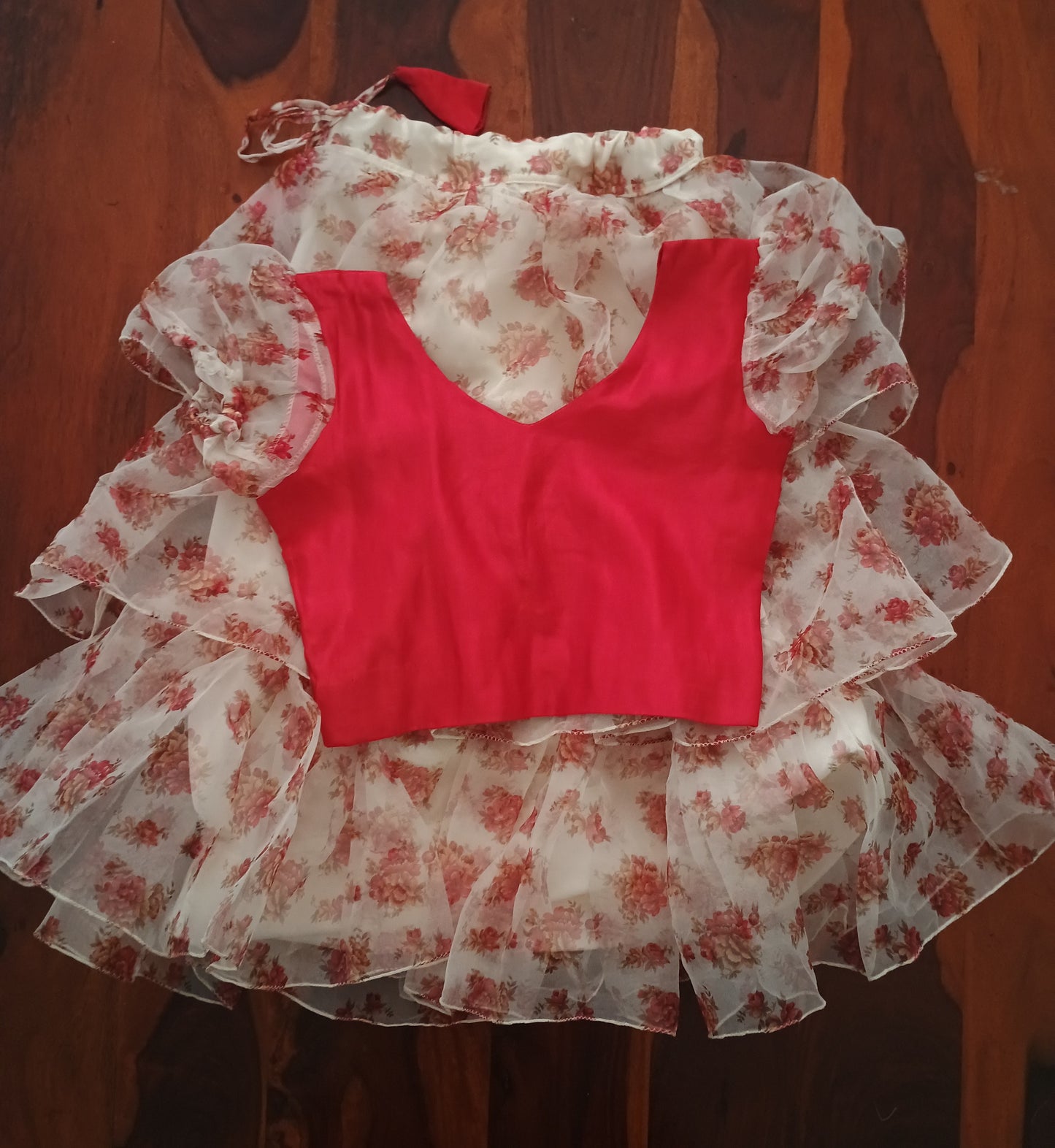 Red crop top with layered floral organza skirt